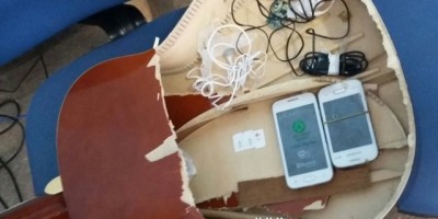 Rolim de Moura – 03 pessoas são detidas tentando entrar no Presídio com aparelhos celulares escondido dentro de um Violão