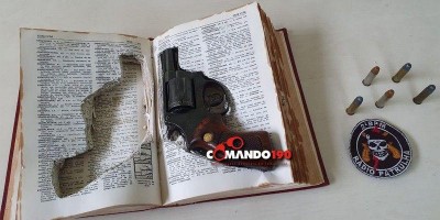 PM localiza revólver escondido dentro de dicionário, em RO