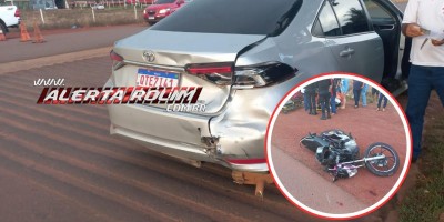 Grave colisão traseira entre táxi e motocicleta deixou mulher com fratura na perna nesta tarde, em Rolim de Moura 