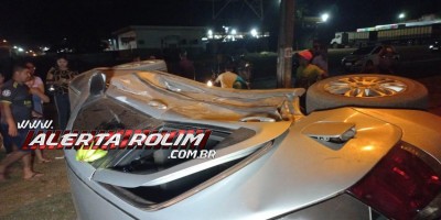 Carro de aplicativo tombou ao ser atingido por outro veículo, em Rolim de Moura - Veja o vídeo da colisão 