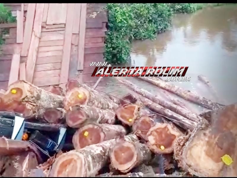 Caminhão cai em rio após ponte ceder na linha 176, lado Norte, em Rolim de Moura Caminhão cai em rio após ponte ceder na linha 176, lado Norte, em Rolim de Moura